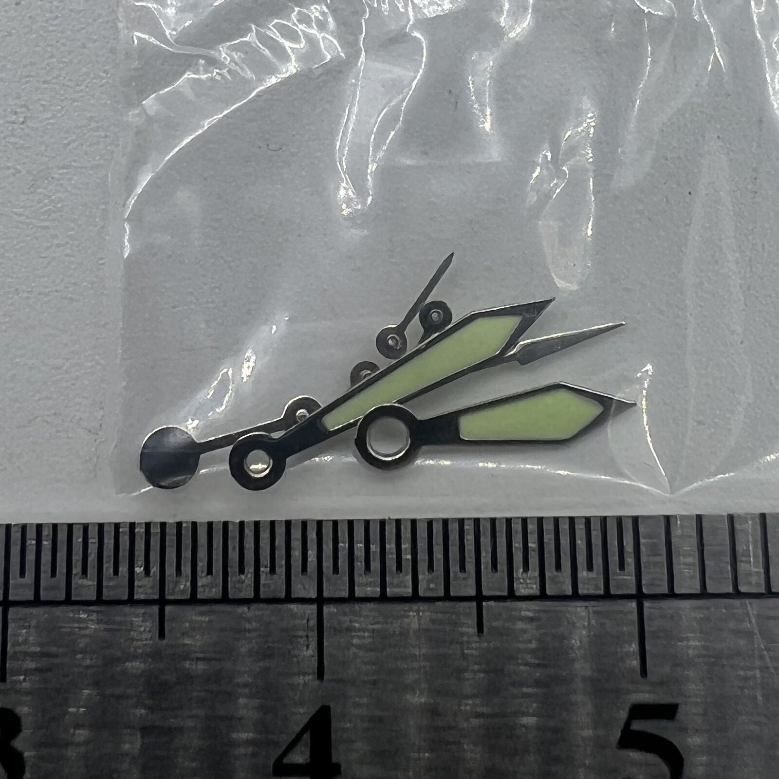 Silver-trimmed green luminous watch hands, 11mm, compatible with Miyota 0S20 movement.
