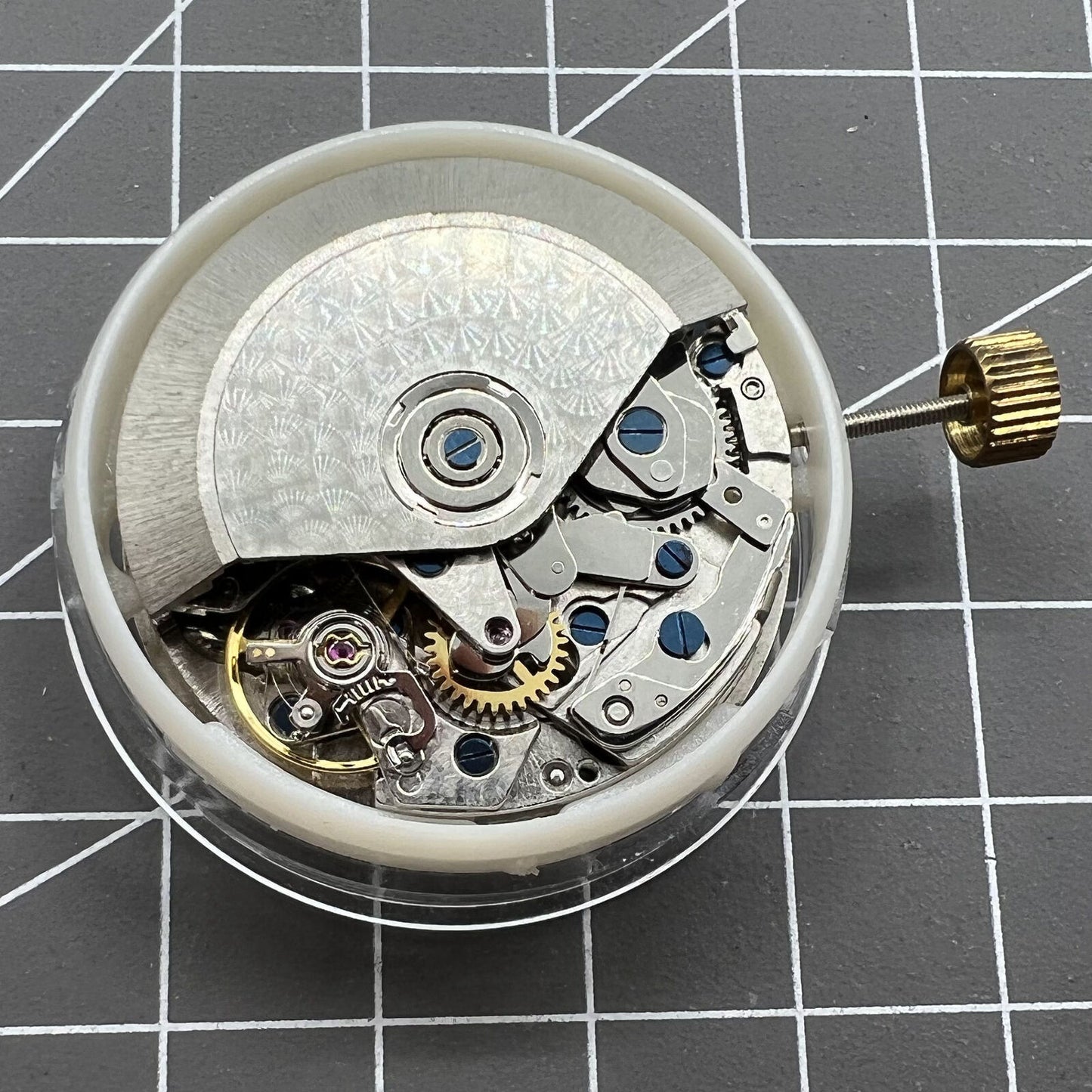 Asia Made 7750 black mechanical watch movement featuring single calendar and small seconds at 3, 6, and 9 o'clock positions.