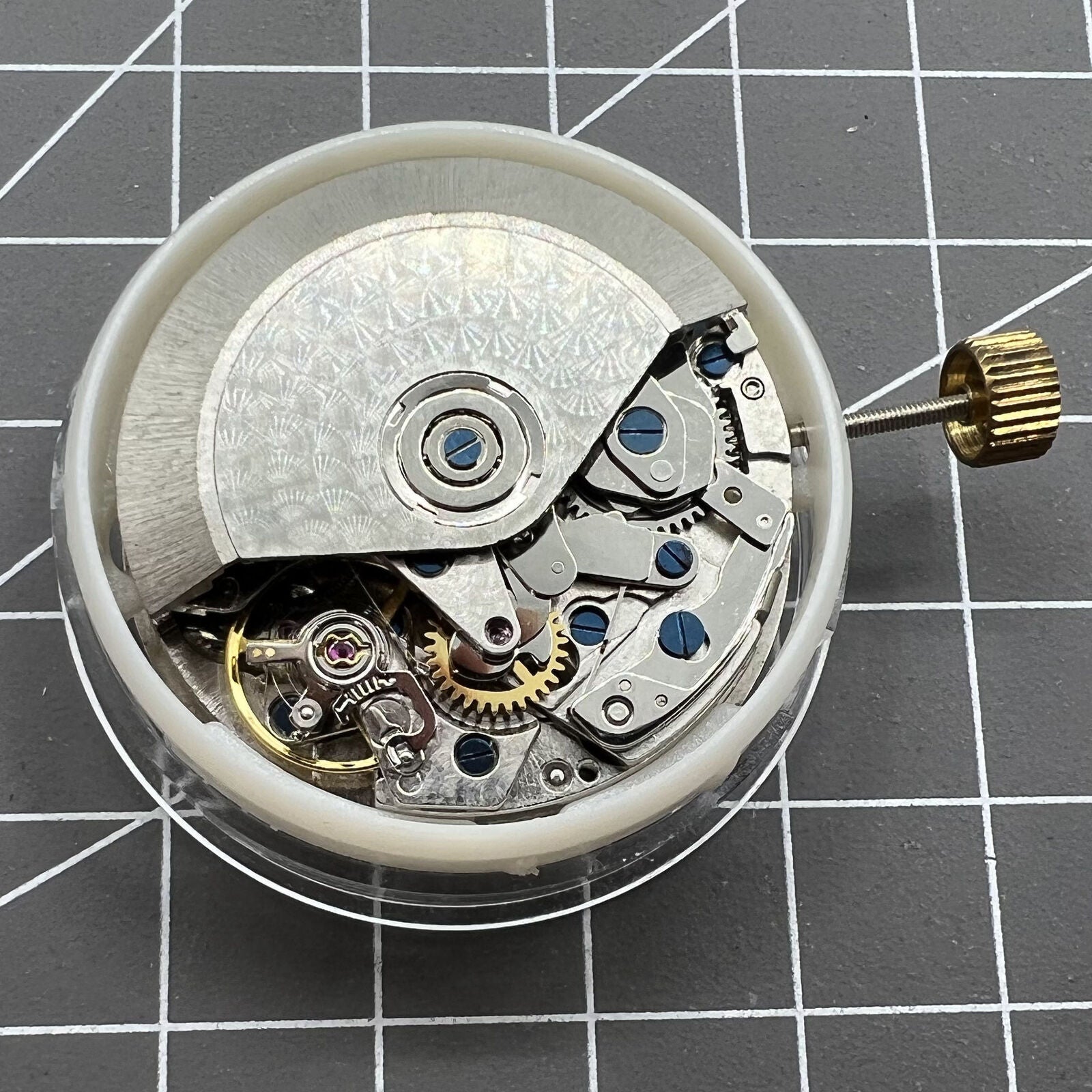 Asia Made 7750 black mechanical watch movement featuring single calendar and small seconds at 3, 6, and 9 o'clock positions.