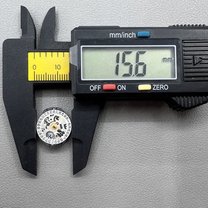 Seiko 7N82D quartz watch movement close-up showing precise timekeeping mechanism for durability.