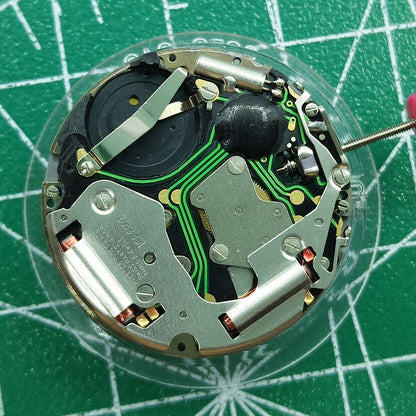 Swiss ISA 8162 quartz watch movement with date at 6, precision replacement for reliable timekeeping.