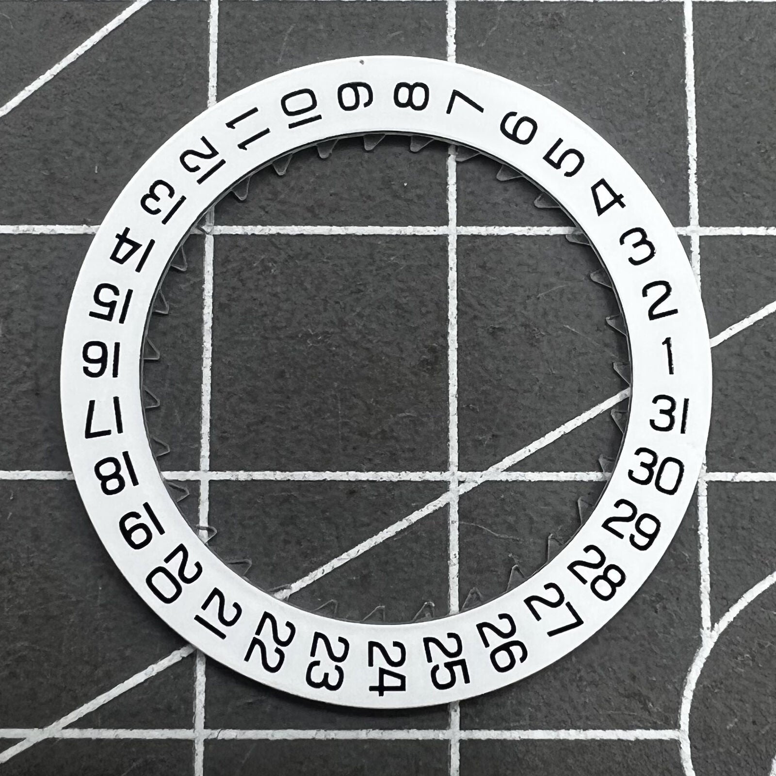 White date disk wheel for ETA C01.211 watch movement, showing date at 3 o'clock position.