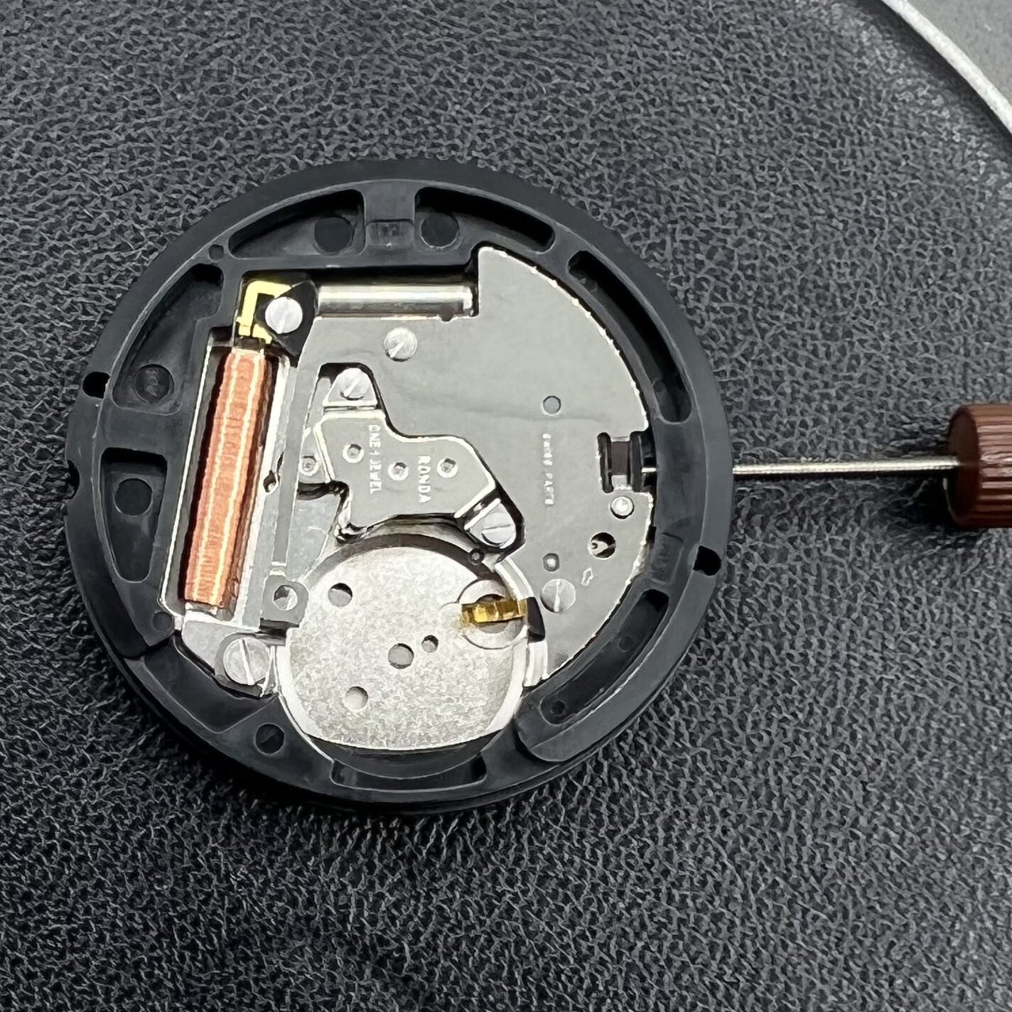 Ronda 517 quartz watch movement with day and date display at 3 o'clock position, suitable for watch accessories.