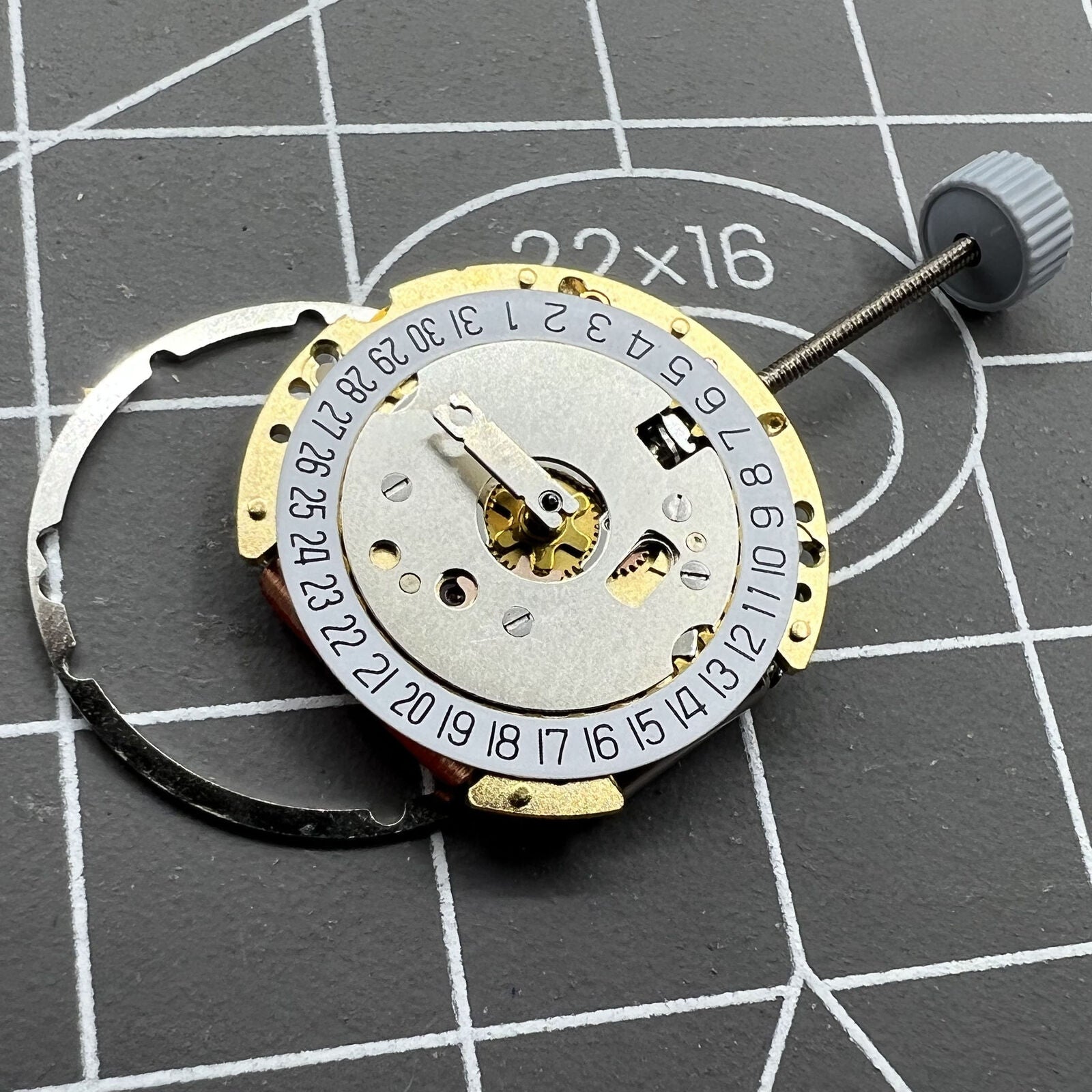 Golden Swiss Made Ronda 775 quartz watch movement with date display at 6 o?clock, ideal for Swiss brands.