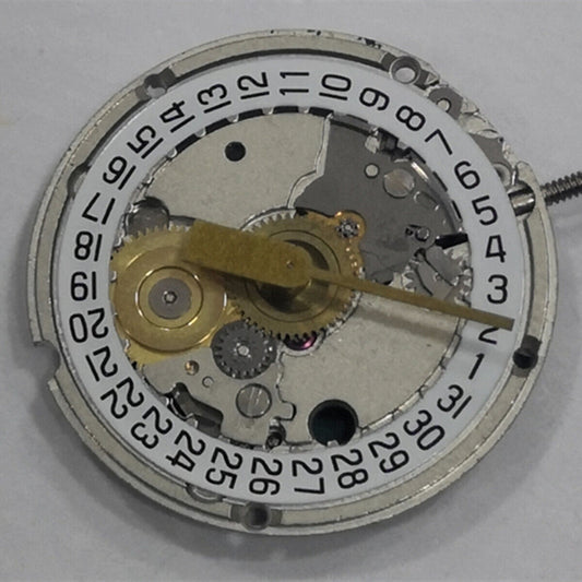 ETA 956.114 white dial quartz watch movement replacement, three-hand design for precise timekeeping.
