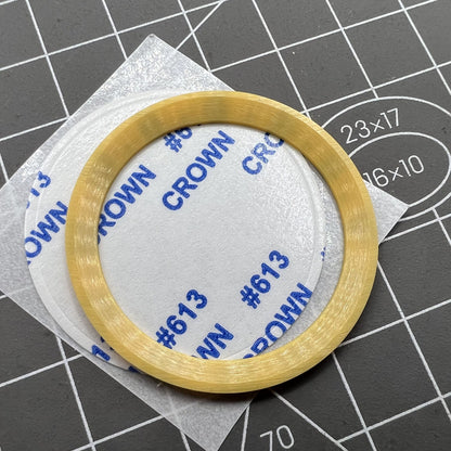 38mm ceramic Slope GMT bezel ring with black font for SUB007 watch against vibrant yellow background.