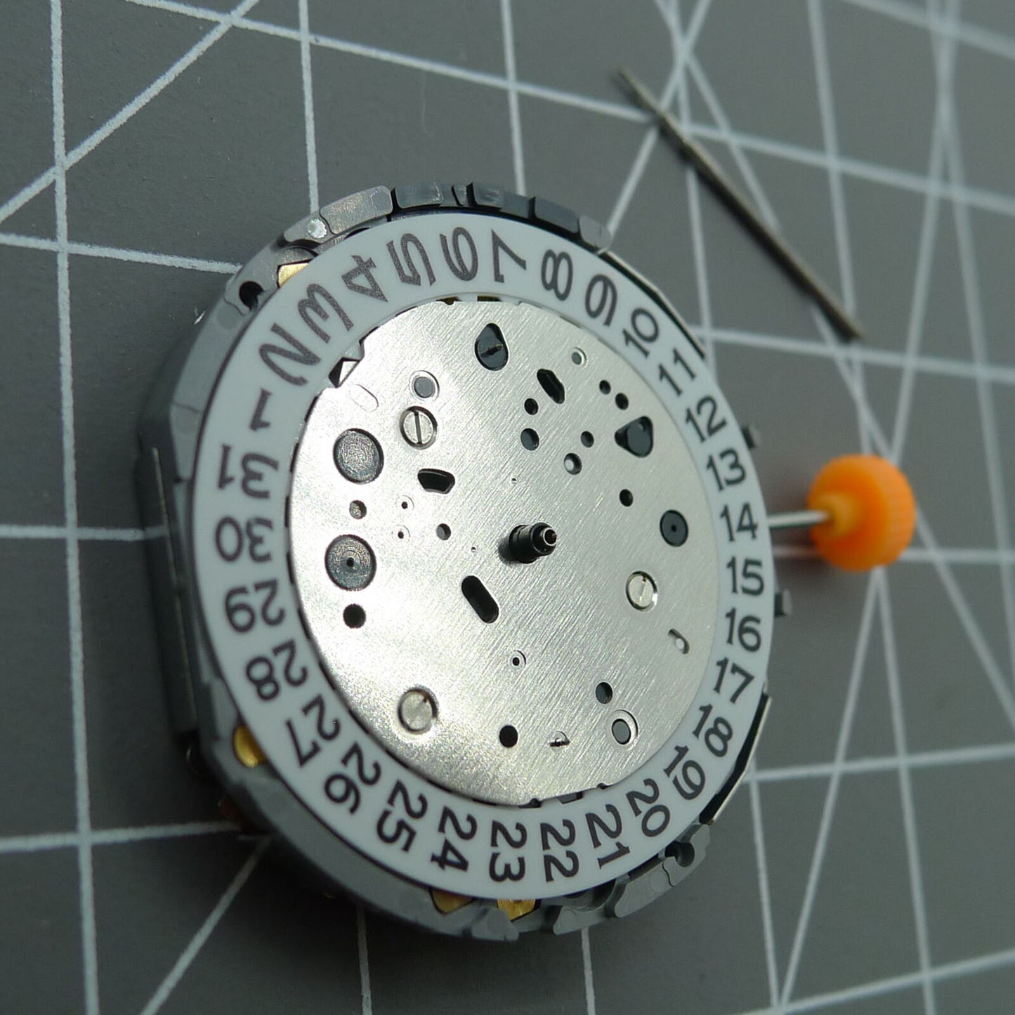 Japan Miyota JP11 quartz watch movement showing date display at 3 o'clock, reliable precision timekeeping by Miyota.