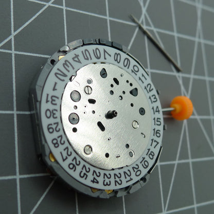 Japan Miyota JP11 quartz watch movement showing date display at 3 o'clock, reliable precision timekeeping by Miyota.