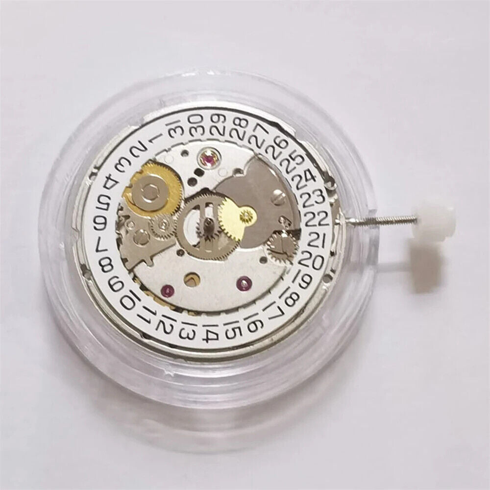 China Made 2824 automatic mechanical watch movement with black balance wheel and 3 hands for precise timekeeping.