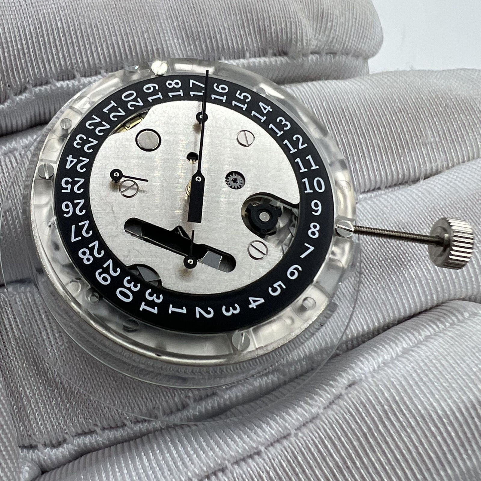 Swiss Made ETA C01.211 chronograph watch movement with black dial, mechanical precision by 1853 brand.