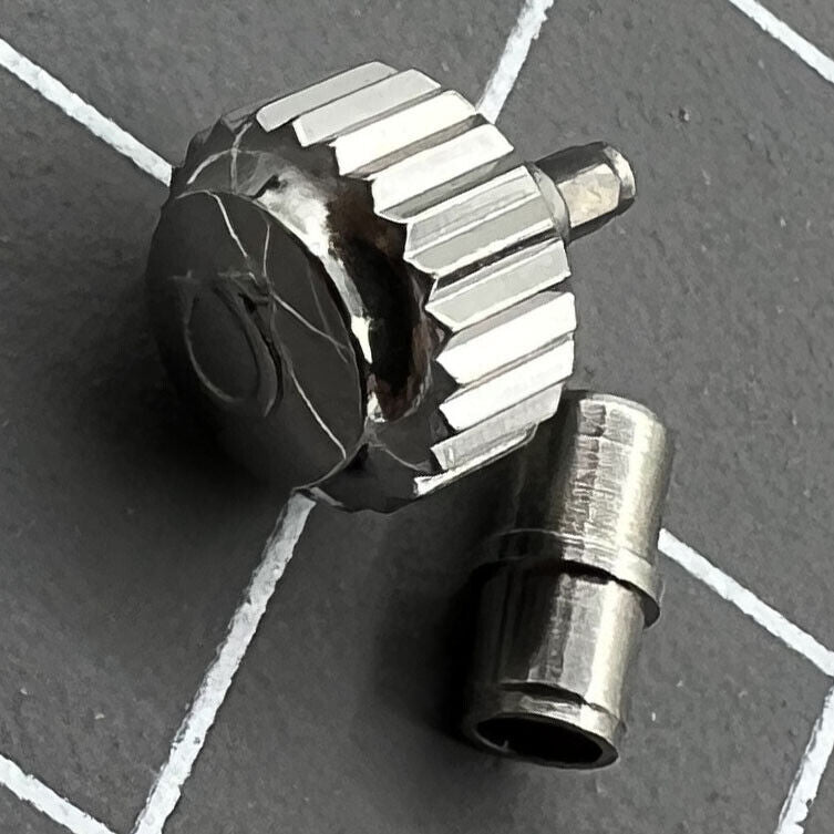 Polished 6.3mm silver watch crown with tube for OMEGA Seamaster 300, precision accessory.