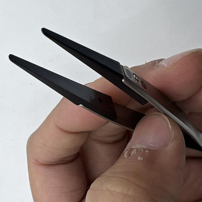 Bergeon 6571-CPR-2A precision tweezers with angled tips for delicate watch repair tasks.