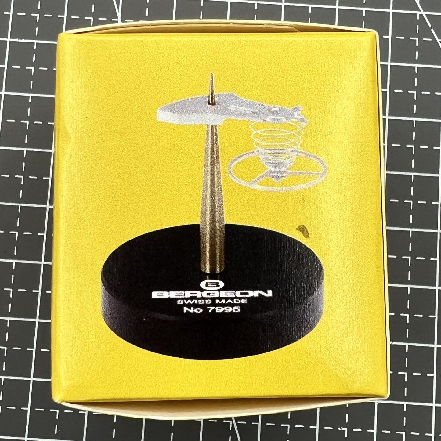 Swiss Bergeon 7995 balance cock support tool for precise watch repair and assembly tasks.