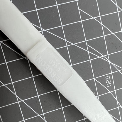 Bergeon 6460 Swiss Made plastic battery tweezer for precise watch battery handling and replacement.