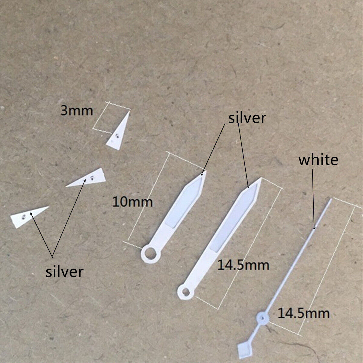 Arrow-shaped silver watch hand with white trim and green lume for VD53 VD54 VD57 movements.