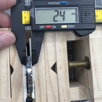 Miyota 6S10 quartz watch movement showing small seconds at 6, 9, 12 o'clock and date window at 3.