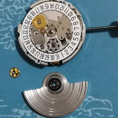 Swiss Made ETA 204.911 mechanical watch movement with automatic winding, precision watch accessory component.
