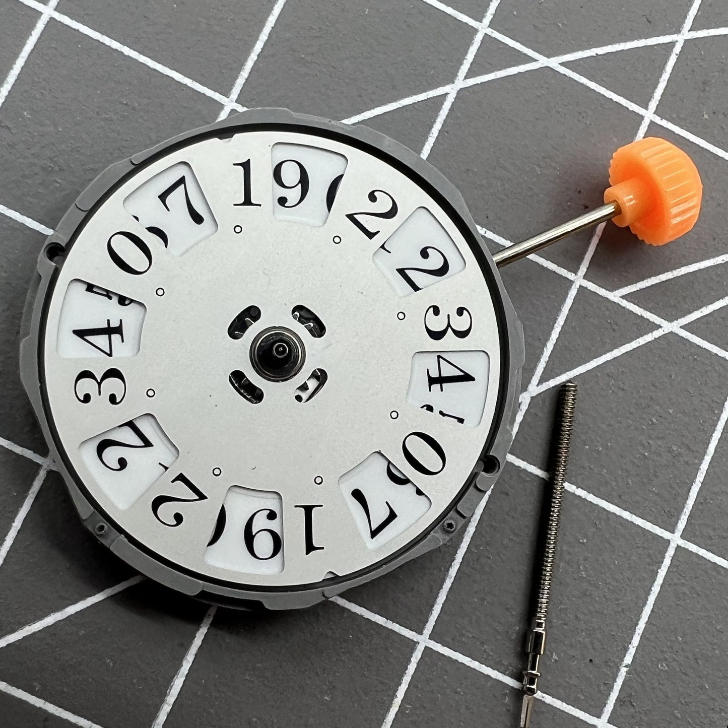 Miyota 1M52 quartz movement watch with date at 12 o'clock and three hands for precise timekeeping