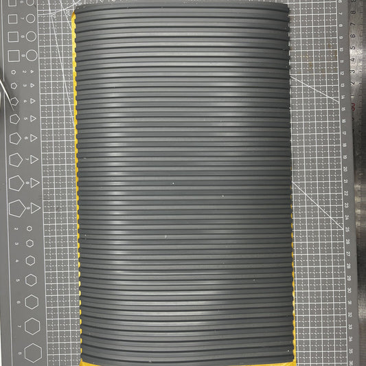 Swiss Bergeon grooved bench mat for watch repair, self-adhesive and durable work surface.