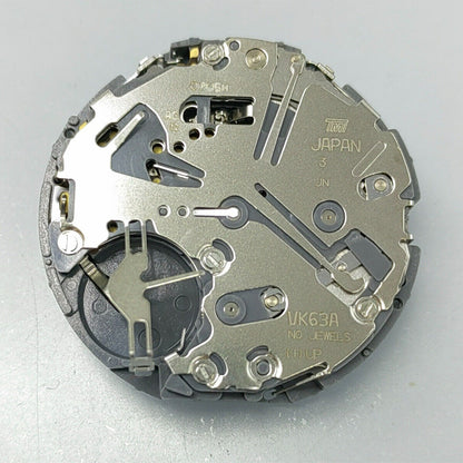 Black disk watch part with Seiko VK63 quartz movement, Japan made, for precise timepiece repair.
