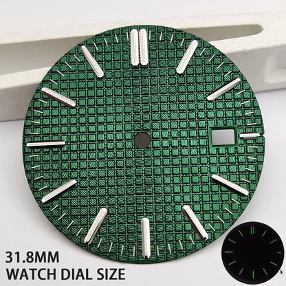 Green lume watch dial with silver trim and nail markers, featuring green check pattern for NH35 movement.