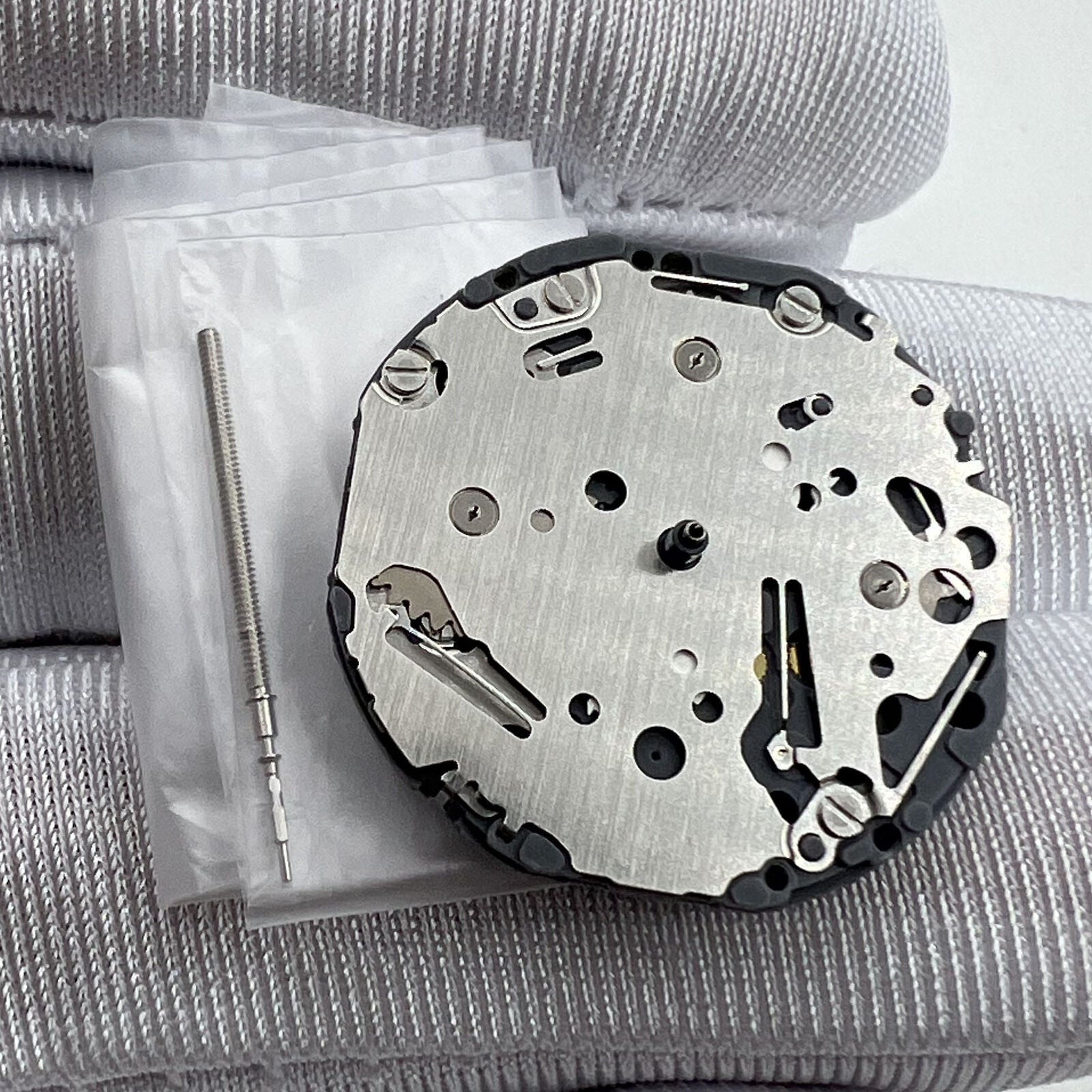 Japan Made Hattori Epson TMI VH63 VH63A quartz watch movement showing intricate mechanical components for precise timekeeping.