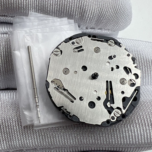 Japan Made Hattori Epson TMI VH63 VH63A quartz watch movement showing intricate mechanical components for precise timekeeping.