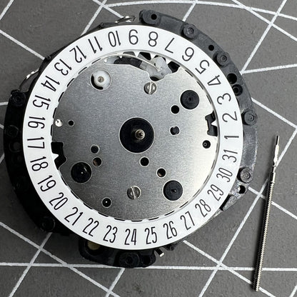Hattori VD52B quartz watch movement with date display at 6 o'clock, precise timekeeping part