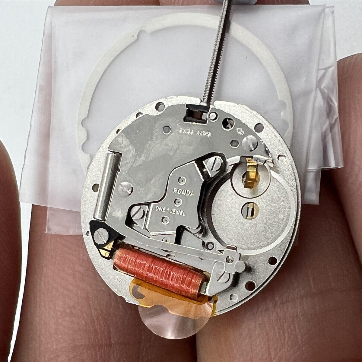 Swiss RONDA 785 golden calendar quartz watch movement by Original Swiss for precise timekeeping and durability.