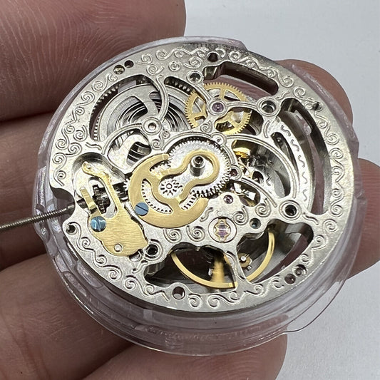 Shanghai Silver hollow carved watch with 3 hands, automatic mechanical movement, elegant China craftsmanship.