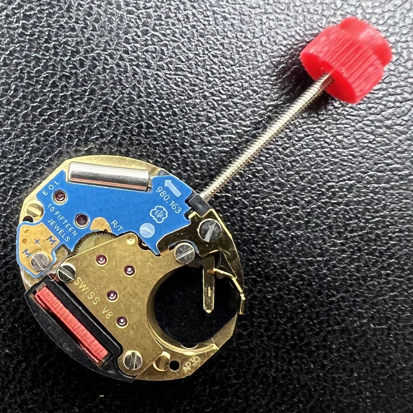 ETA 980.163 quartz watch movement with two hands, precise timekeeping for custom watch repairs and upgrades.