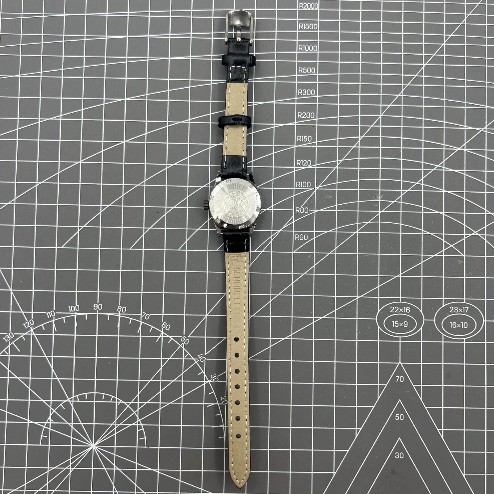 Black Seagull ladies watch case featuring golden nail markers, manual mechanical movement, and shock-resistant build.