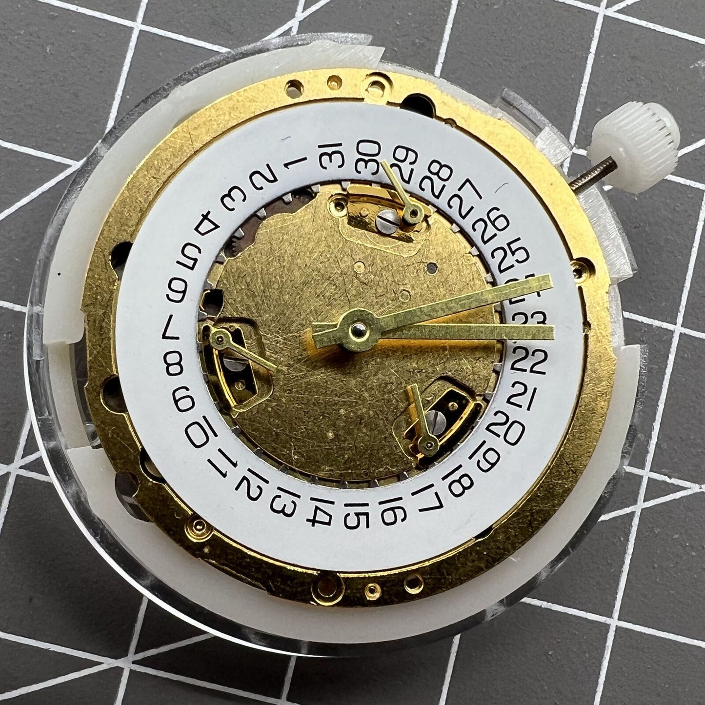 Swiss Made ETA251.272 quartz watch movement with date at 4, precision ETA brand component for watch repairs.