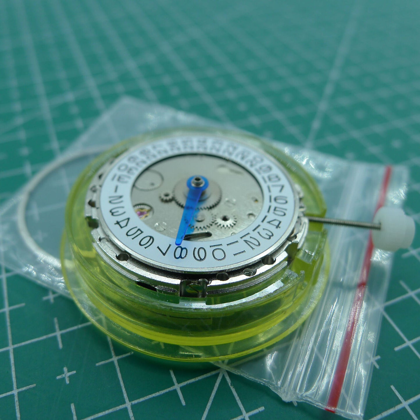 DG2813 mechanical watch movement with 4 hands and adjustable 24-hour GMT, silver finish for precision timepieces.