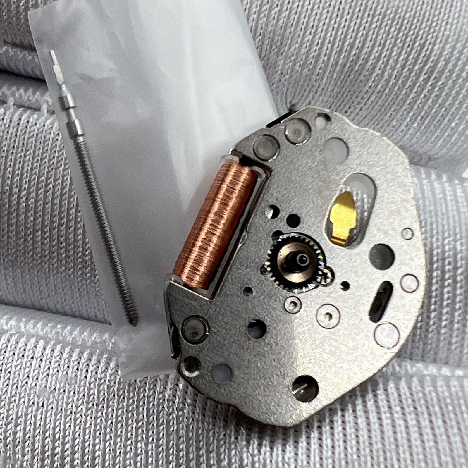 Japan Made Miyota 2035 quartz movement with 3 hands and watch stem for precise timekeeping.