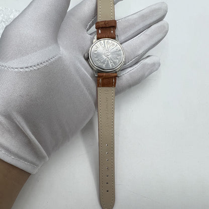 Chunlan 32mm light brown leather watch featuring silver dial and 17-jewel manual mechanical movement.