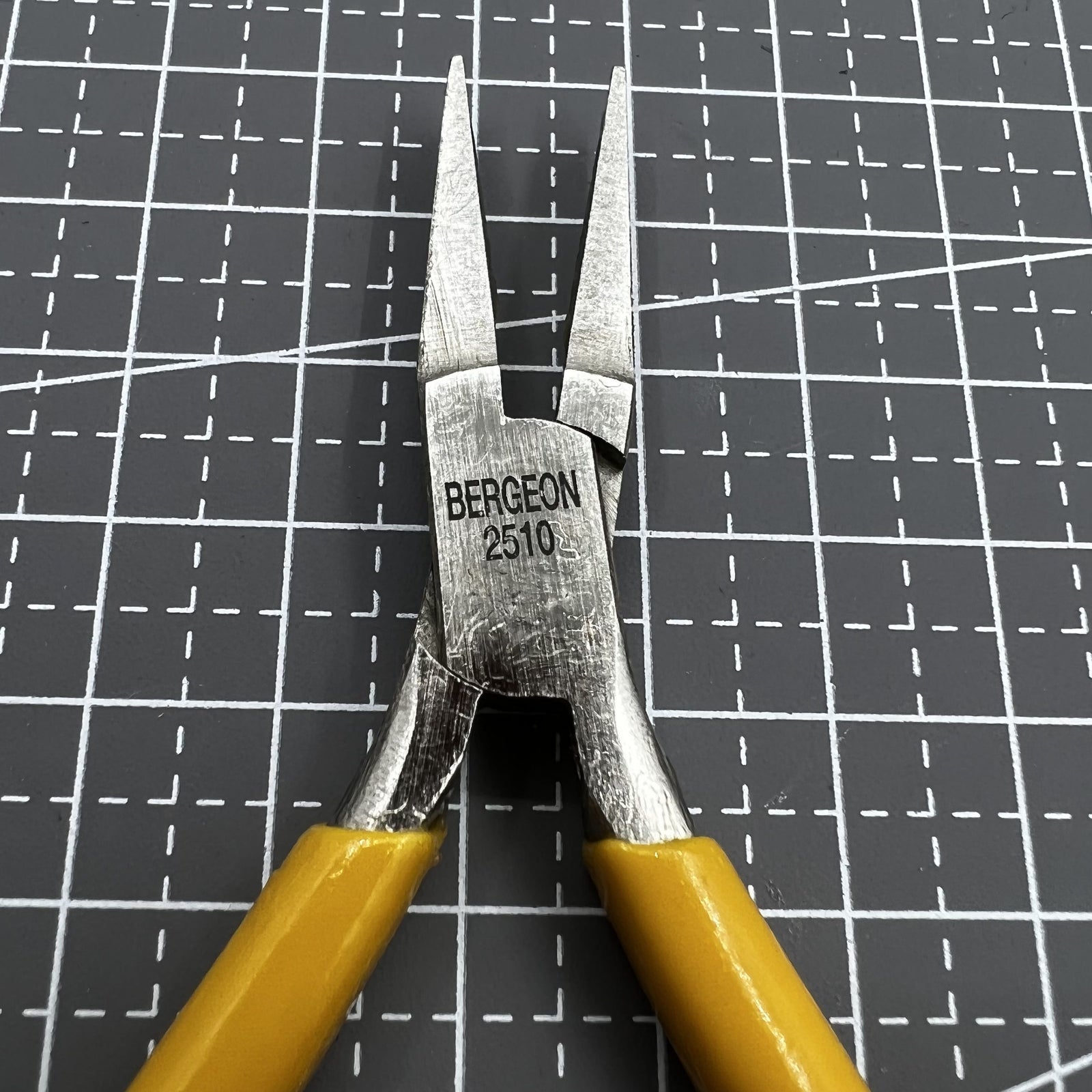 Swiss Bergeon 2510 flat nose pliers with smooth jaws for precise watch accessory adjustments and repairs.