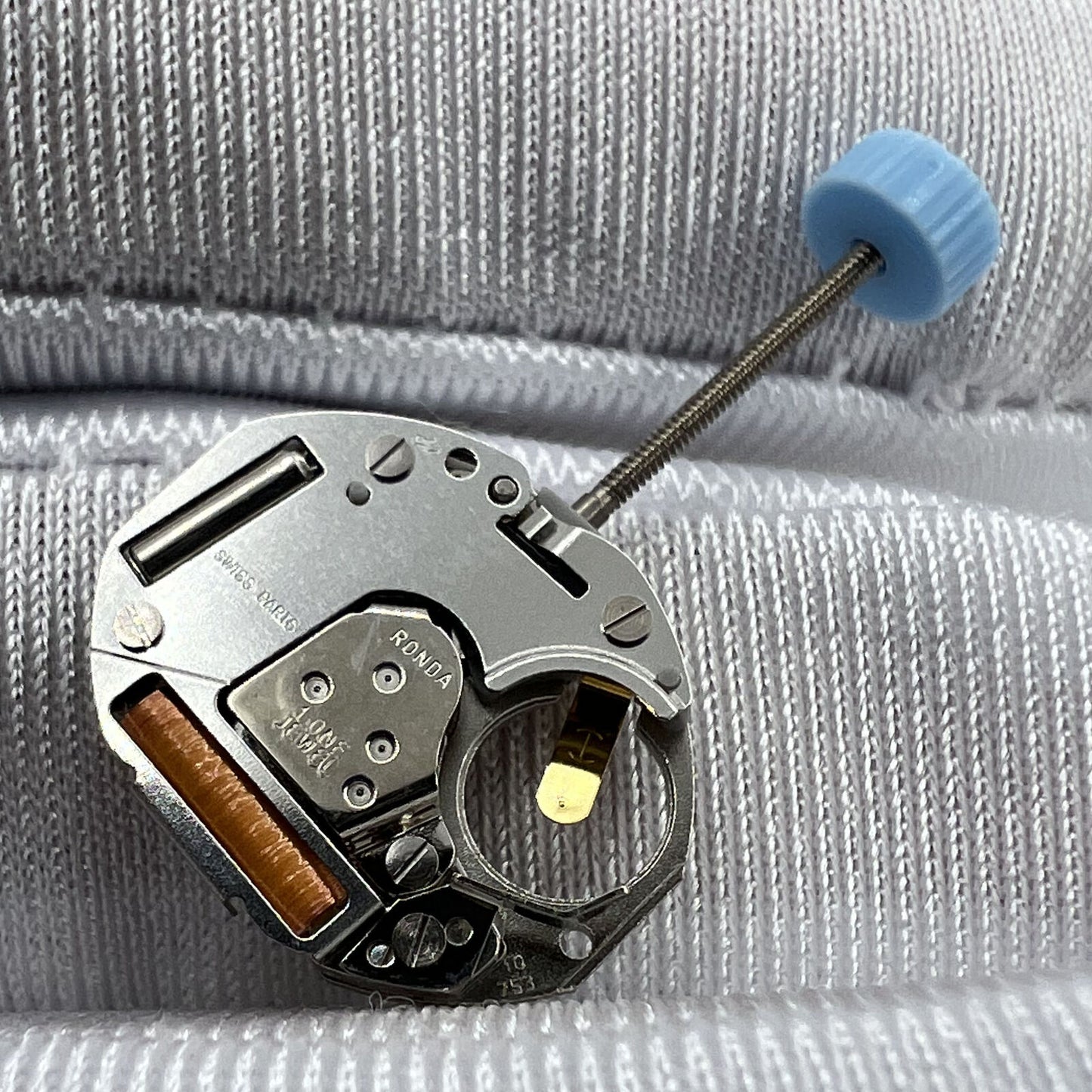 Swiss Movement Ronda 753 quartz watch part showcasing precise timekeeping for watch repairs.