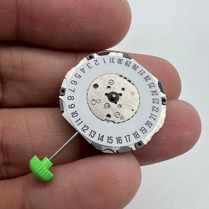 Miyota 4U74 Japan-made quartz movement with date display at 6 o?clock, ideal for watch repairs.