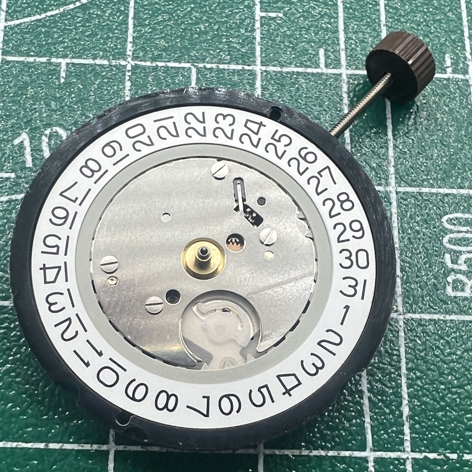 Swiss Made Ronda 515 quartz watch movement with date display at 3 o'clock, Swiss parts precision.