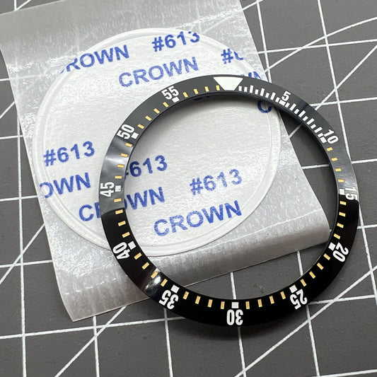 38mm black ceramic watch bezel insert with yellow graduation, durable watch part for precise timekeeping.