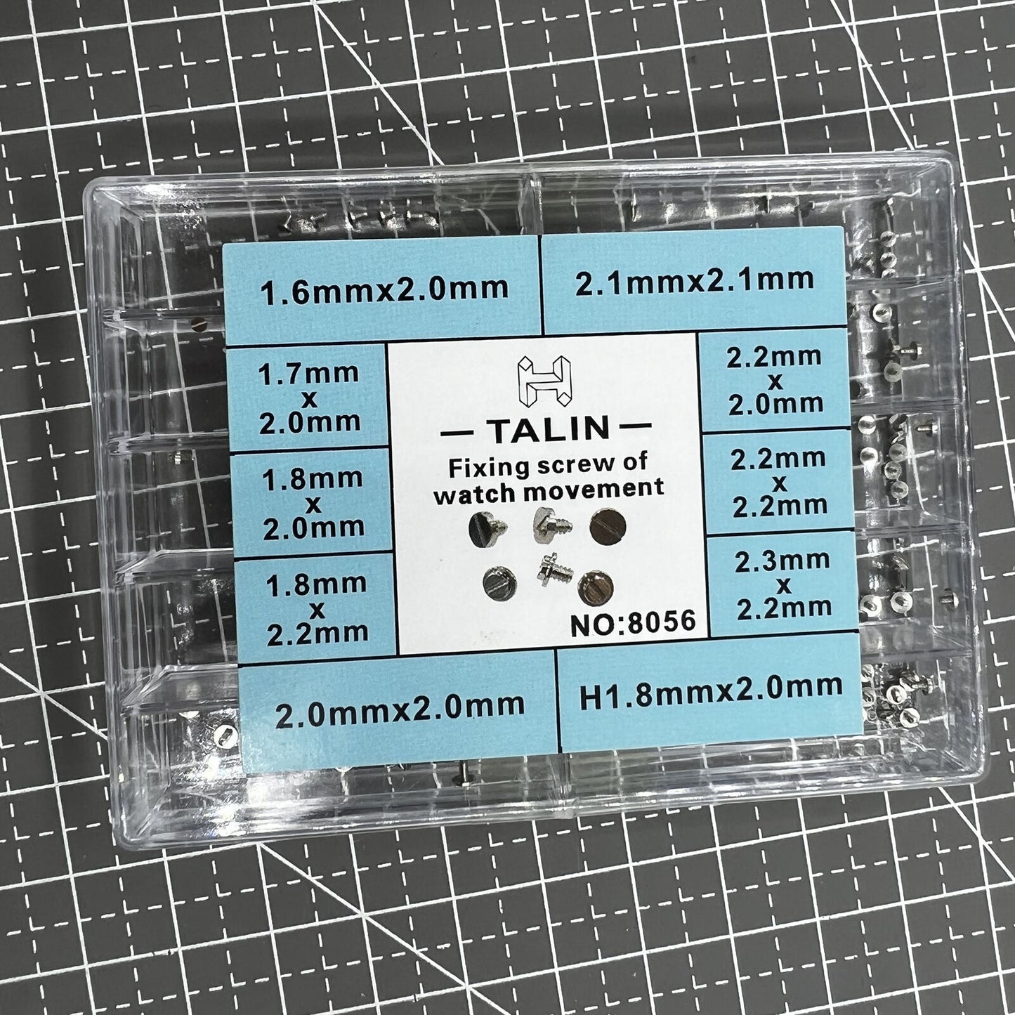 Assortment of watch movement fixing screws in various sizes for precise repairs and adjustments.