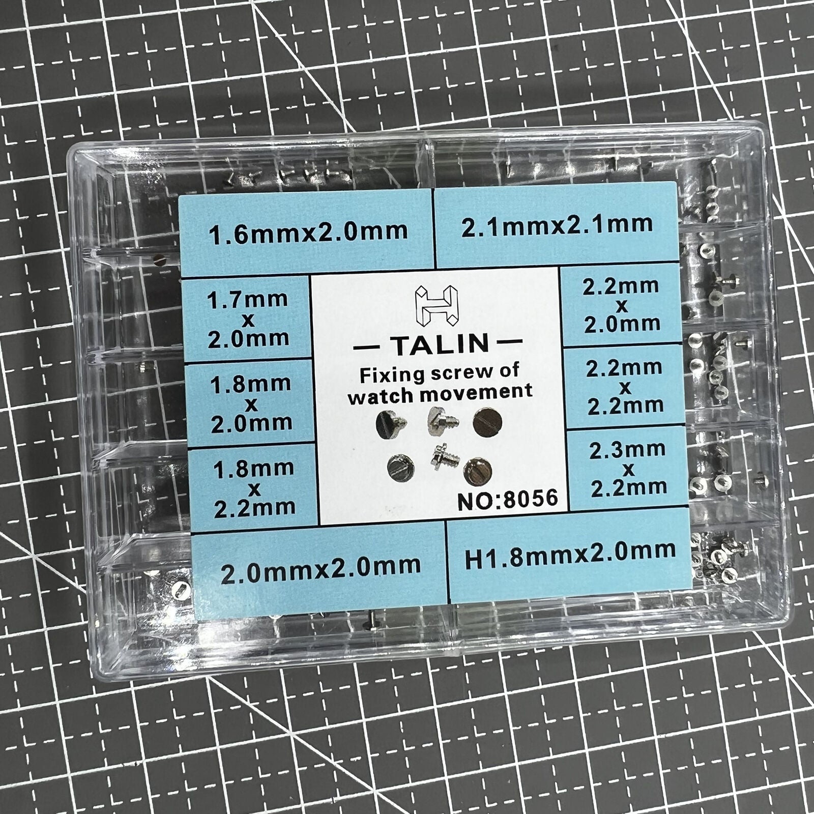 Assortment of watch movement fixing screws in various sizes for precise repairs and adjustments.