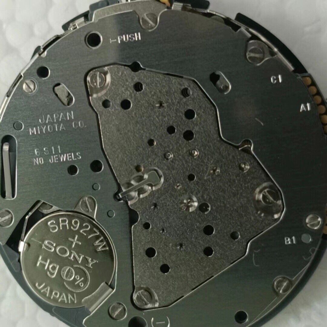 Miyota 6S11 quartz watch movement showing date at 3 o?clock, small seconds at 6, and two hands design