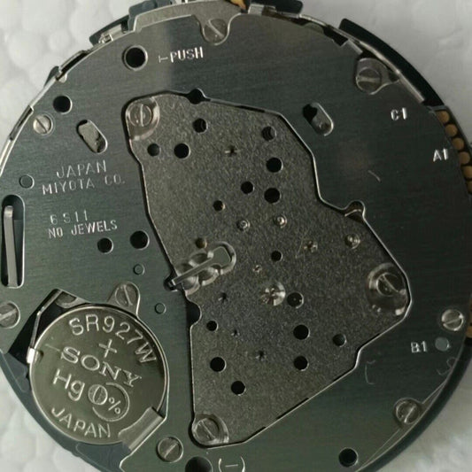 Miyota 6S11 quartz watch movement showing date at 3 o?clock, small seconds at 6, and two hands design