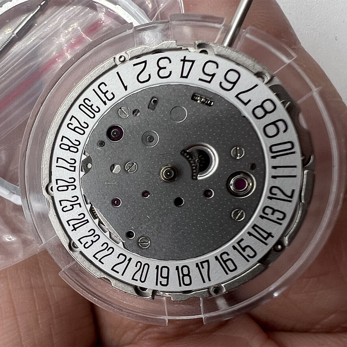 Miyota Citizen 9019 automatic mechanical movement with date at 3 and 6 o'clock positions.