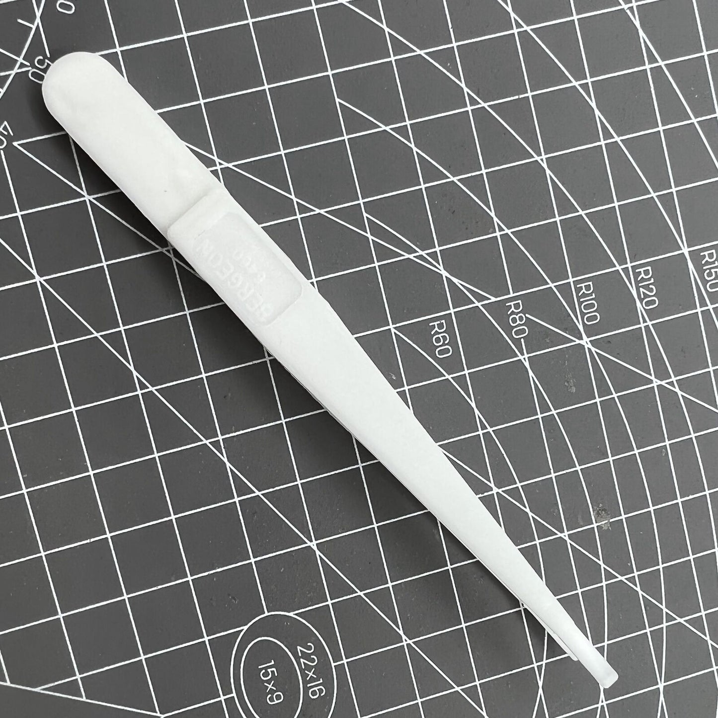 Bergeon 6460 Swiss Made plastic battery tweezer for precise watch battery handling and replacement.