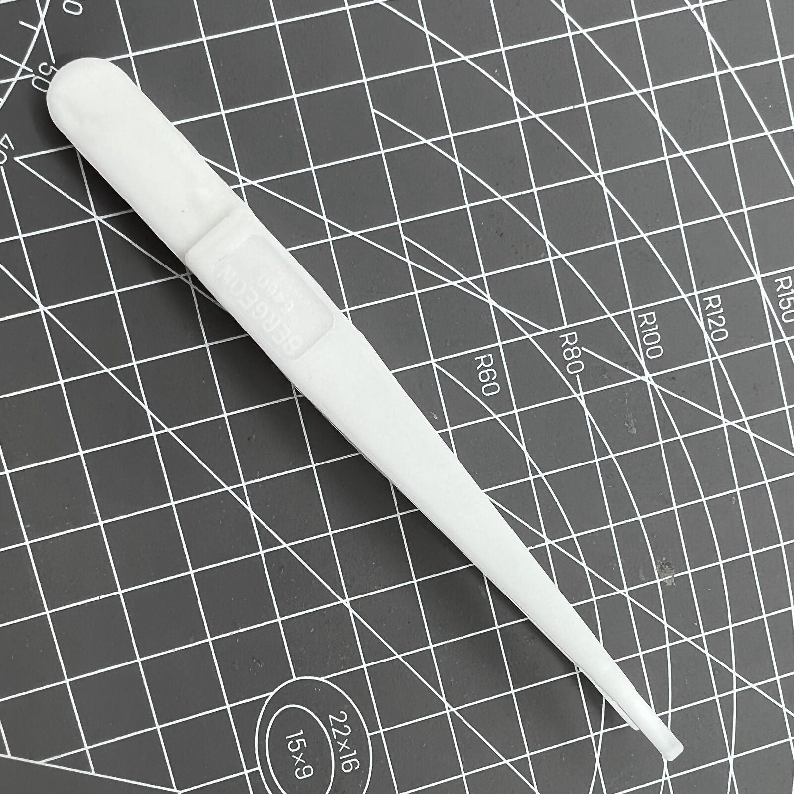 Bergeon 6460 Swiss Made plastic battery tweezer for precise watch battery handling and replacement.