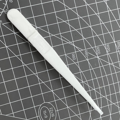 Bergeon 6460 Swiss Made plastic battery tweezer for precise watch battery handling and replacement.