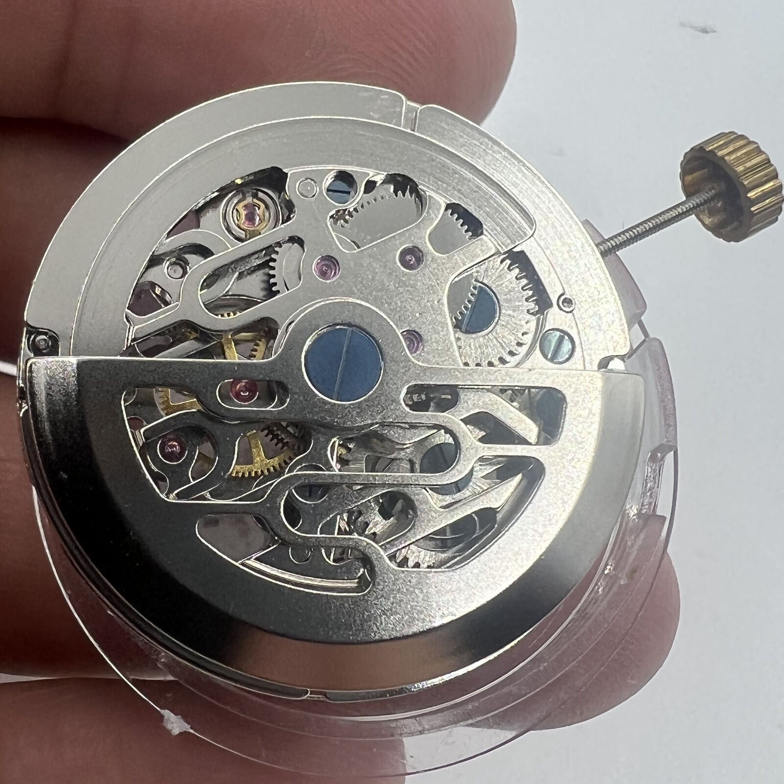 Dandong Hollow Automatic watch, silver movement, small second dial at 9 o?clock, elegant style by Dandong.